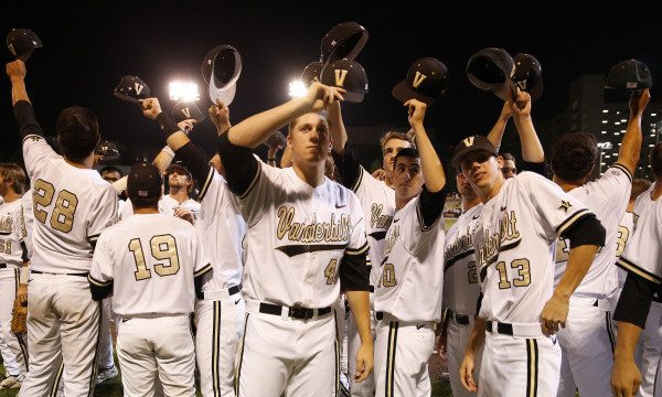 Photo of the Vanderbilt baseball team tipping their hats to the crowd after winning the NCAA regional in Nashville representing the 2013 season